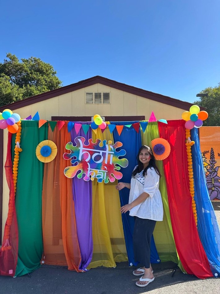 Willow Glen\u2019s Annual Holi Celebration backdrop with Holi Hai signage